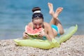 Young woman eats watermelon Royalty Free Stock Photo