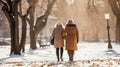 Young Woman With Elderly Grandmother In Park In Winter. Help For The Elderly During Winter
