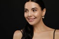 Young woman with elegant pearl earrings on black background, closeup. Space for text Royalty Free Stock Photo