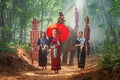 Young woman and Elephant mahout portrait. The Kuy Kui People of Thailand. Elephant Ritual Making or Wild Elephant Catching