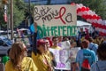 Young Woman Encouraging AIDSwalk Participants Royalty Free Stock Photo