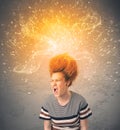 Young woman with energetic exploding red hair Royalty Free Stock Photo