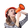 Young woman engineer with a megaphone .isolated on white Royalty Free Stock Photo