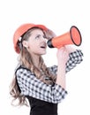 Young woman engineer with a megaphone .isolated on white Royalty Free Stock Photo