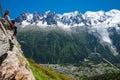 Young woman enjoing the view to Charmonix village, French Alps a