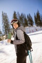 Young woman enjoing winter day of skiing fun in the snow Royalty Free Stock Photo