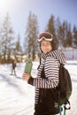 Young woman enjoing winter day of skiing fun in the snow Royalty Free Stock Photo