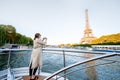 Woman enjoying landscape view on Paris city from the boat Royalty Free Stock Photo