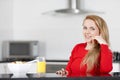 Young woman enjoying breakfast