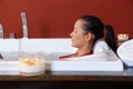 Young woman enjoying bubble bath