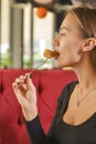 Young woman enjoying coffee time. Attractive caucasian girl in a cafe drinking a cup of coffee Royalty Free Stock Photo