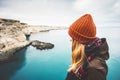 Young Woman enjoying cold sea view alone Royalty Free Stock Photo