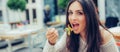 Young woman enjoying food in a restaurant, having her lunch break Royalty Free Stock Photo