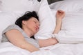 Young woman enjoying a good restful sleep