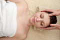 Young woman enjoying head massage at spa Royalty Free Stock Photo