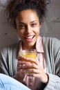 Young woman enjoying her fruit juice drink Royalty Free Stock Photo