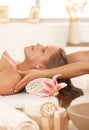 Young woman enjoying massage Royalty Free Stock Photo