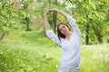 Young woman enjoying nature in a park