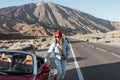 Carefree woman traveling by car Royalty Free Stock Photo