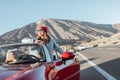 Carefree woman traveling by car Royalty Free Stock Photo