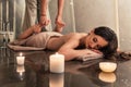 Young woman enjoying the stretching techniques of Thai massage