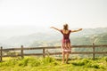 A young woman enjoying the sun on a meadow Royalty Free Stock Photo