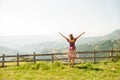 A young woman enjoying the sun on a meadow Royalty Free Stock Photo