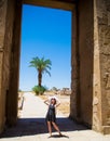 Young woman enjoying sunlight and travel Egypt. Positive thinking concept