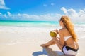 Young woman enjoying sunny day on tropical beach Royalty Free Stock Photo