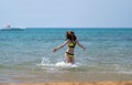 Young woman enjoying a vacation at the seaside Royalty Free Stock Photo