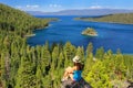 Young woman enjoying the view of Emerald Bay at Lake Tahoe, Cali Royalty Free Stock Photo