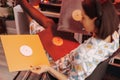 Young woman enjoying vinyl records in cozy room Royalty Free Stock Photo