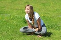 Young woman of European appearance does yoga in summer nature Royalty Free Stock Photo