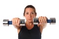 Young woman exercising with dumbbells