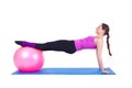 Young woman exercising with fit-ball