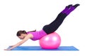 Young woman exercising with fit-ball