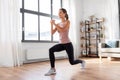 Young woman exercising at home Royalty Free Stock Photo