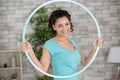 young woman exercising with hula hoop Royalty Free Stock Photo