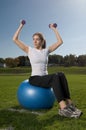 Young woman exercising outdoors Royalty Free Stock Photo