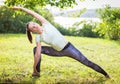 Young woman exercising outdoors in nature Royalty Free Stock Photo