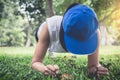 Young woman exercising workout fitness doing planking outside on Royalty Free Stock Photo