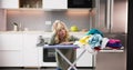 Young Woman Exhausted While Ironing Clothes Royalty Free Stock Photo