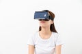 Young woman experience virtual reality on a mobile phone