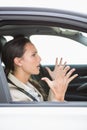 Young woman experiencing road rage Royalty Free Stock Photo