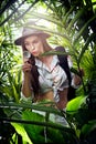 Young woman exploring jungle environment