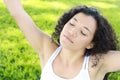 Young woman expressing freedom outdoors. Royalty Free Stock Photo