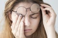 Young woman with eye fatigue Royalty Free Stock Photo