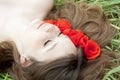 Young woman face in flowers