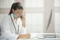 Female doctor working on computer telework concept Royalty Free Stock Photo