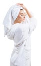 Young woman face with perfect skin and bath towel on head. Royalty Free Stock Photo